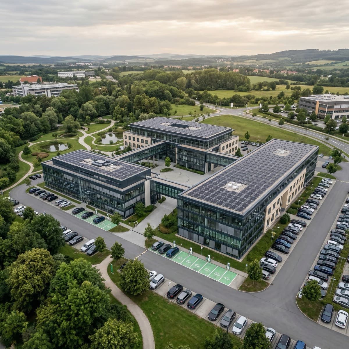Commercial office park with solar panel arrays on multiple buildings